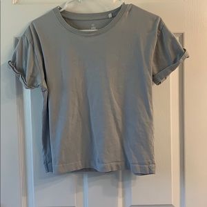 light blue tshirt with folded sleeves